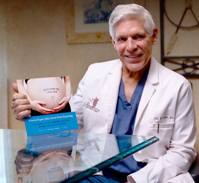 Dr. Parker holding e0guide