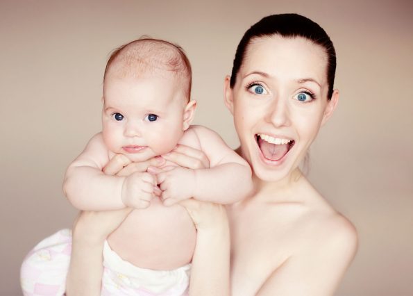 woman holding infant child