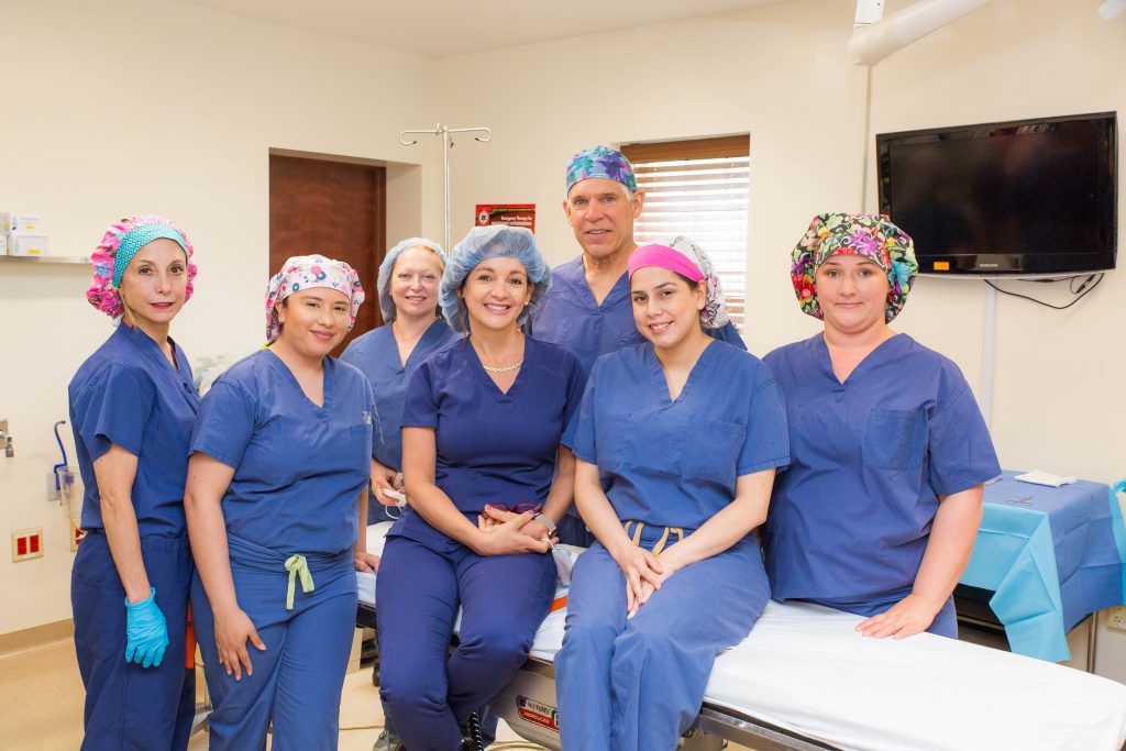 Dr. Parker and operating room team in blue scrubs
